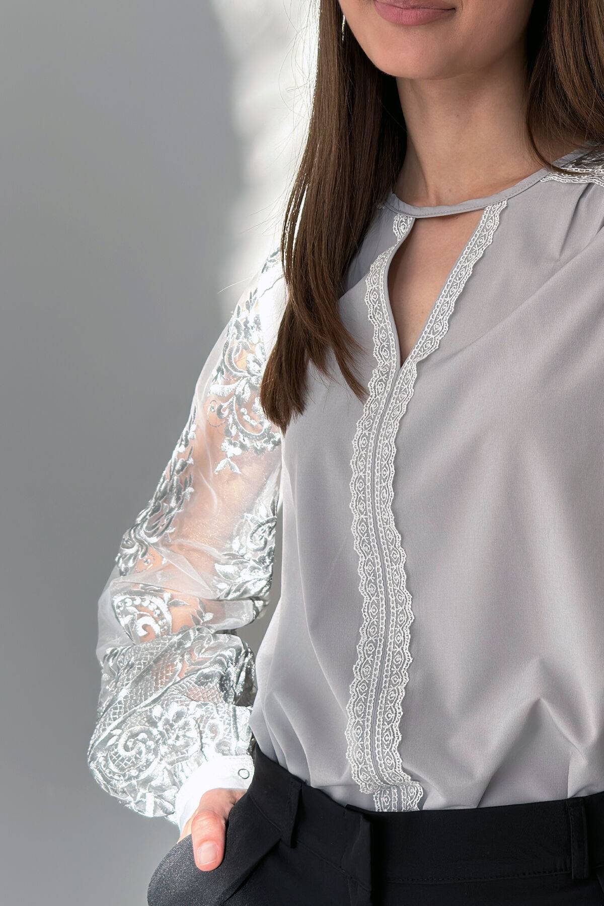 Lady's chiffon blouse. Grey